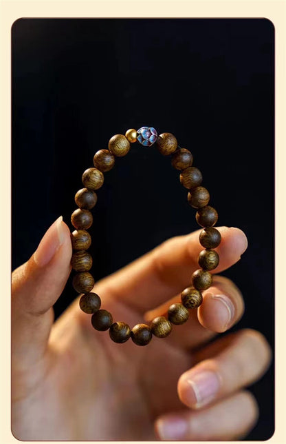 ZenHima Qi Nan Agarwood Mala Beads Bracelet with Lotus Design - ZENHIMA