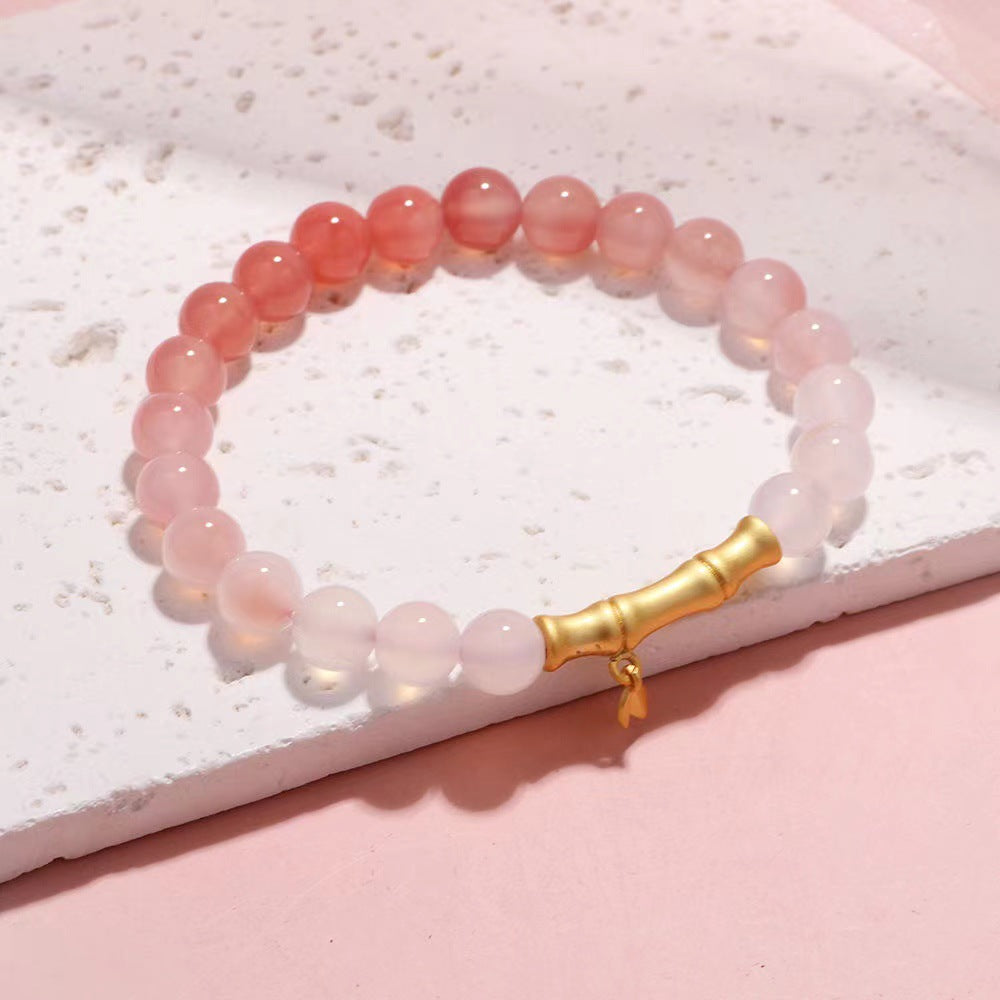 Armband aus natürlichem Regenbogenachat in Form einer Pfirsichblüte – Symbol für Glück und Schönheit