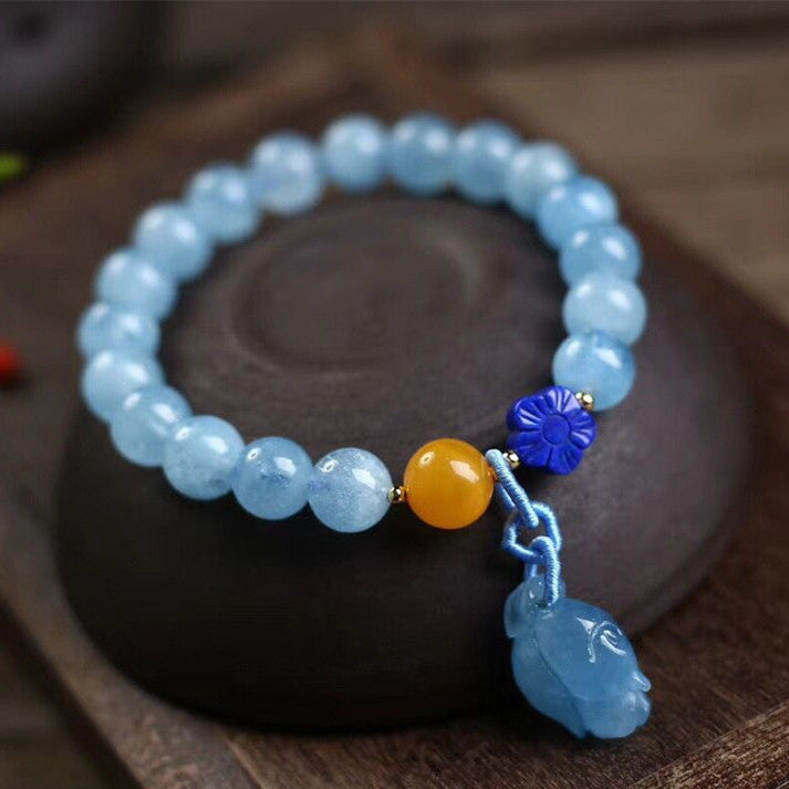 Aquamarin-Armband mit kleinen Blüten aus Bernstein und Lapislazuli