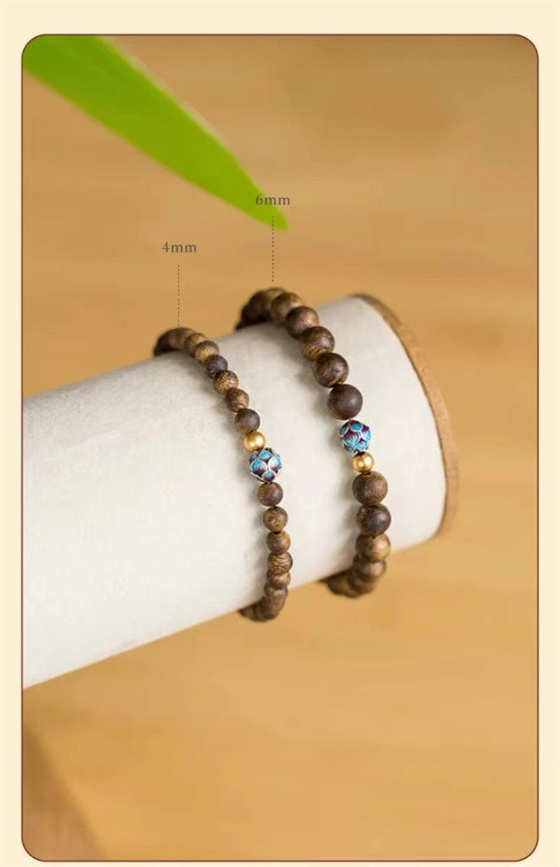 ZenHima Qi Nan Agarwood Mala Beads Bracelet with Lotus Design - ZENHIMA