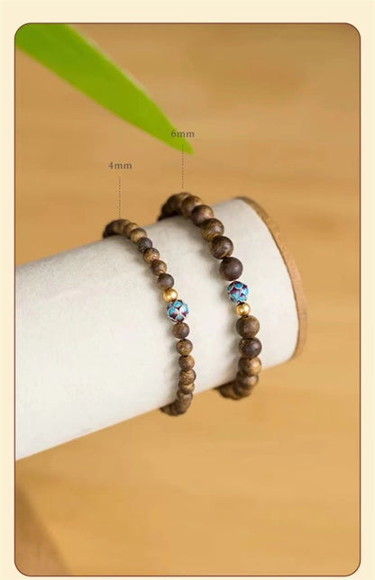 ZenHima Qi Nan Agarwood Mala Beads Bracelet with Lotus Design - ZENHIMA