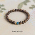 ZenHima Qi Nan Agarwood Mala Beads Bracelet with Lotus Design - ZENHIMA