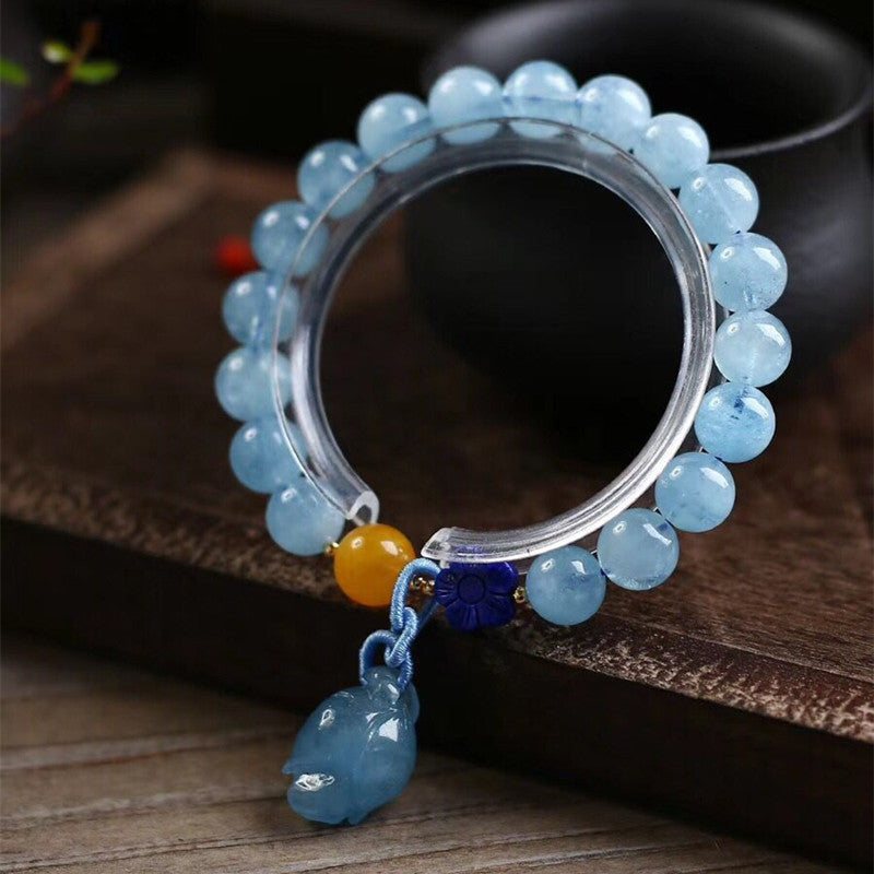 Aquamarin-Armband mit kleinen Blüten aus Bernstein und Lapislazuli