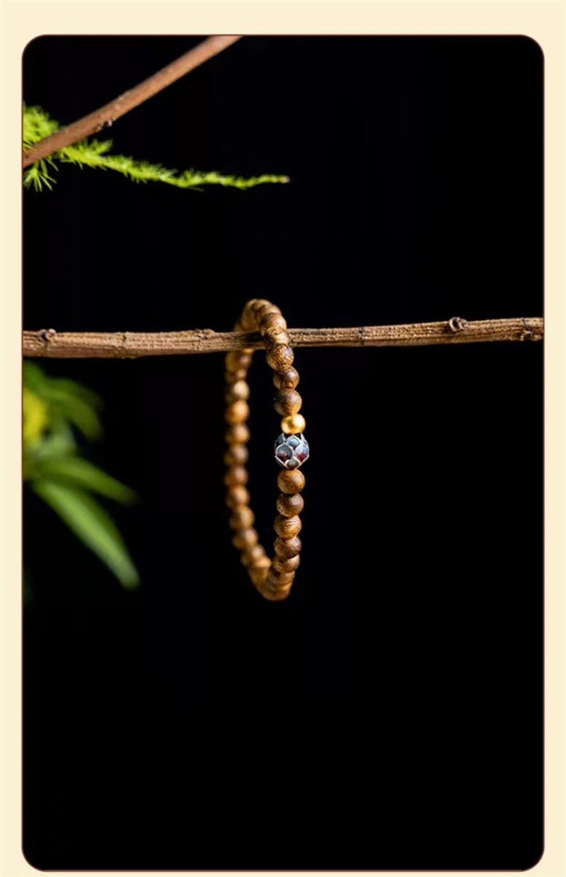 ZenHima Qi Nan Agarwood Mala Beads Bracelet with Lotus Design - ZENHIMA
